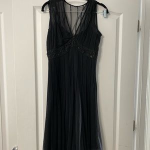 Beautiful beaded black dress.